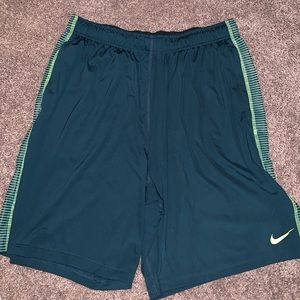 Green Nike athletic shorts